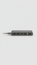 Certified pre-owned USB-C hub, Default angle is a precise 3/4 view that highlights the device’s geometry and material...